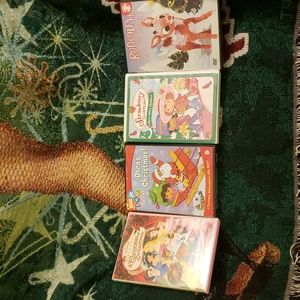 CHRISTMAS dvd's Rudolph,Disney Princesses,Dora, and Strawberry Shortcake.